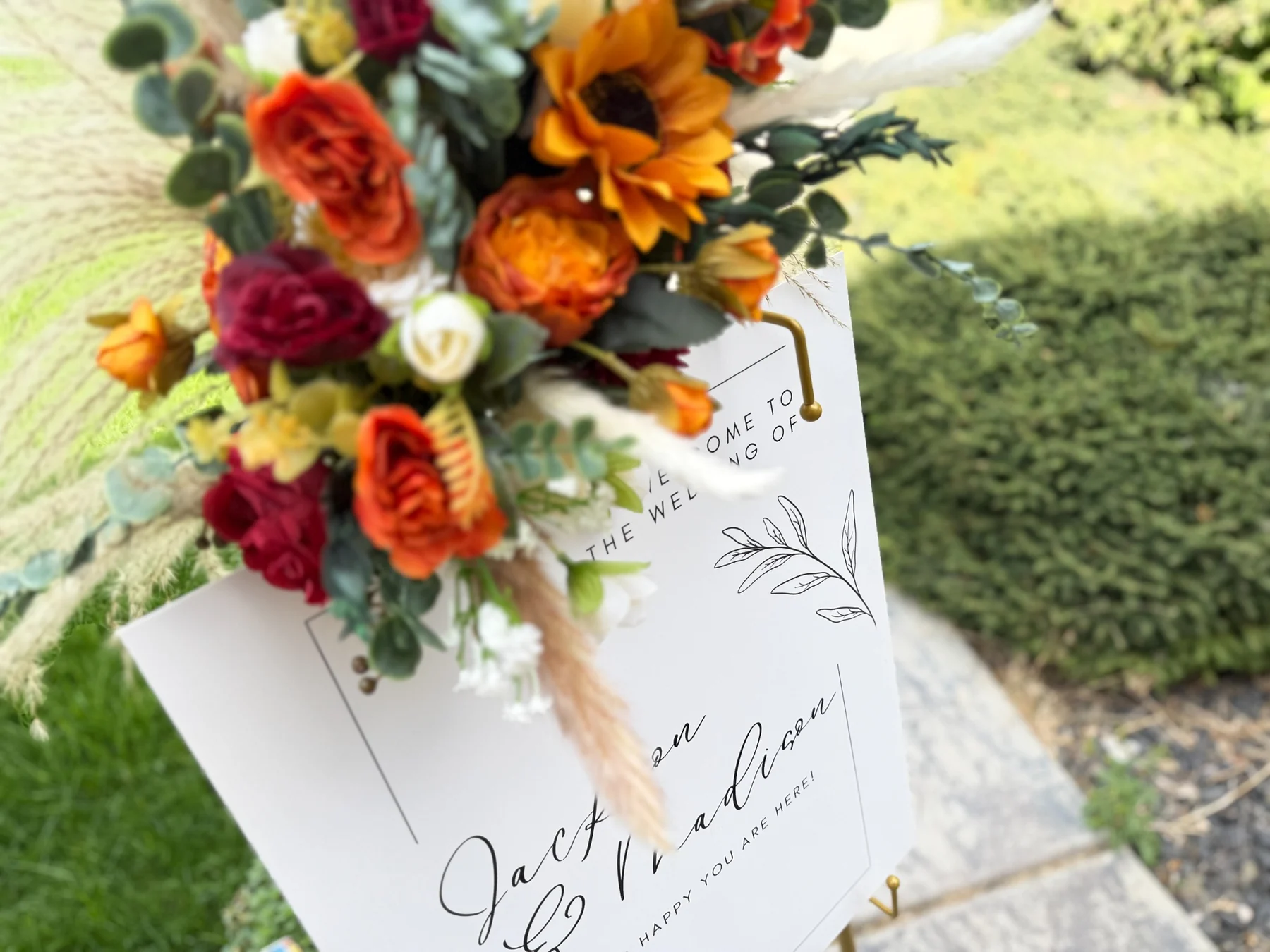Styled wedding easel detail outdoors