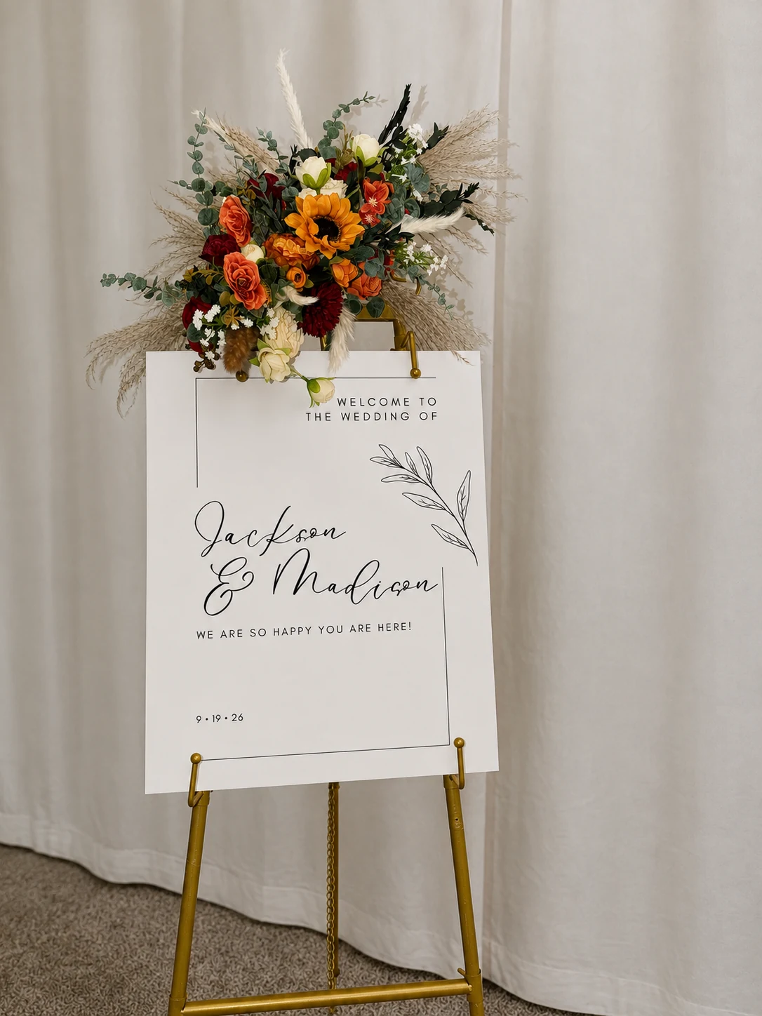 Fall floral arrangement on styled easel
