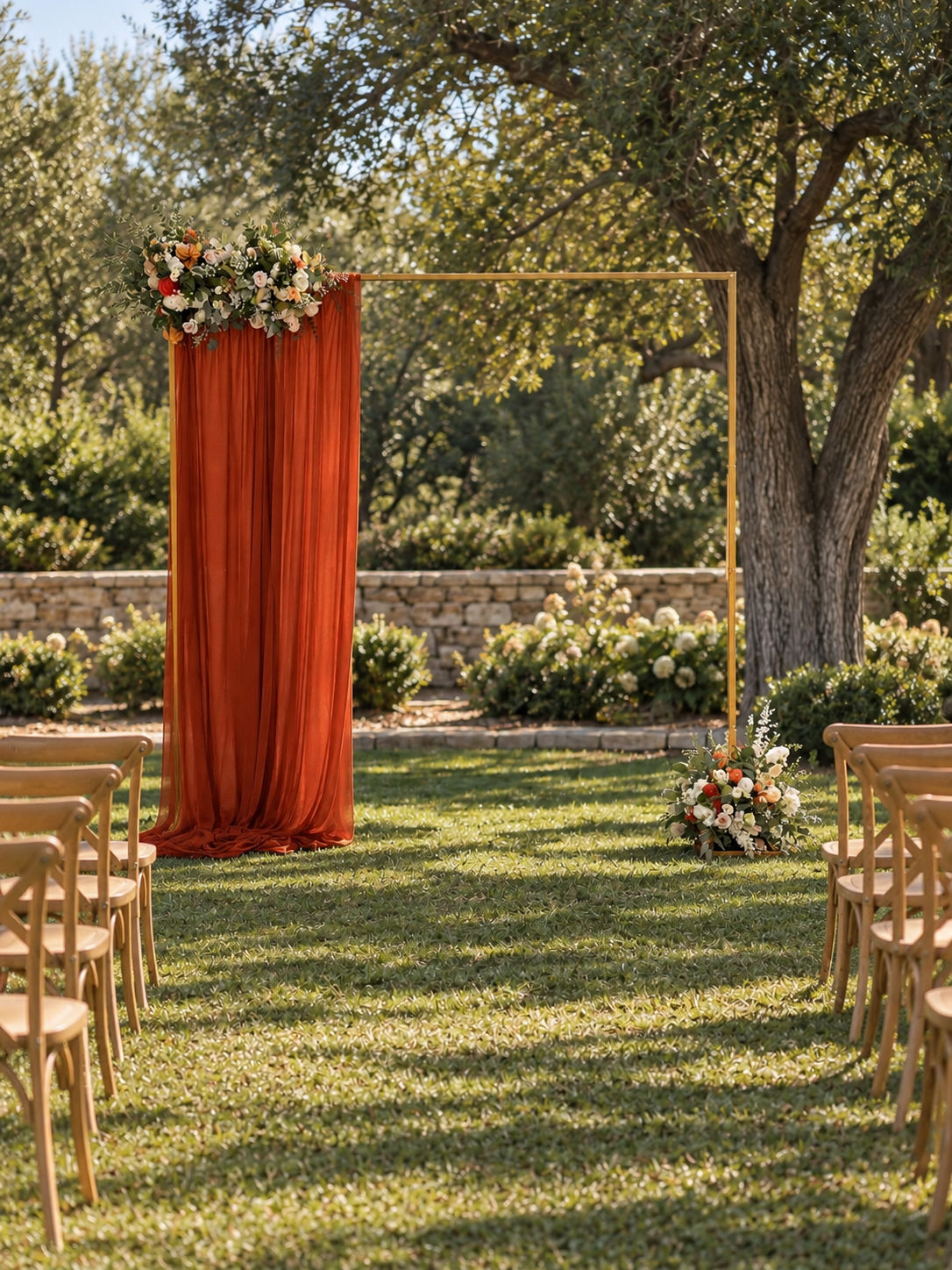 Gold square arch with terracotta half draping and floral accents